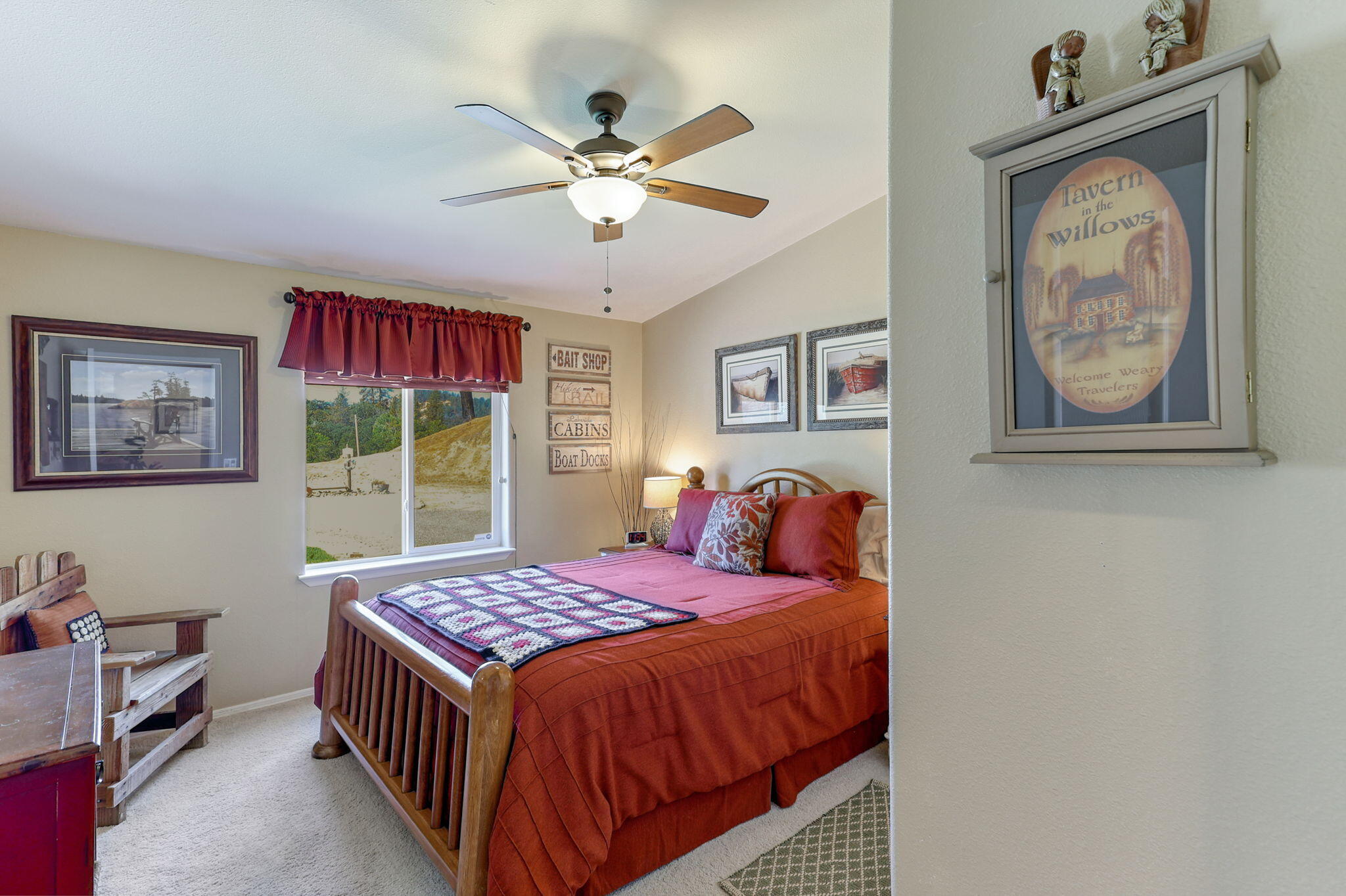 551 Lewiston Road Lewiston, CA 96052 - Photo 27 of 51 a bedroom with a bed and a chandelier