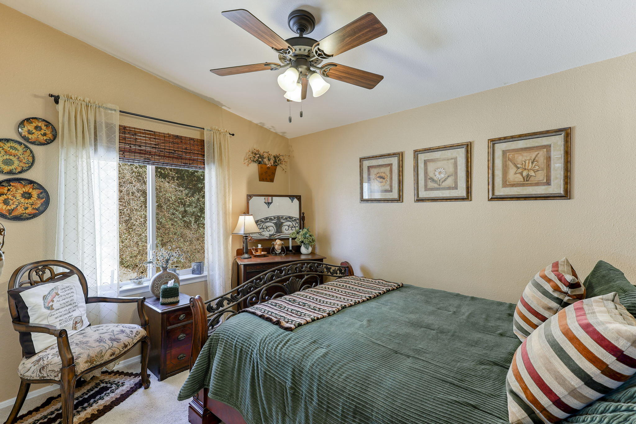 551 Lewiston Road Lewiston, CA 96052 - Photo 32 of 51 a bedroom with a bed and a chandelier
