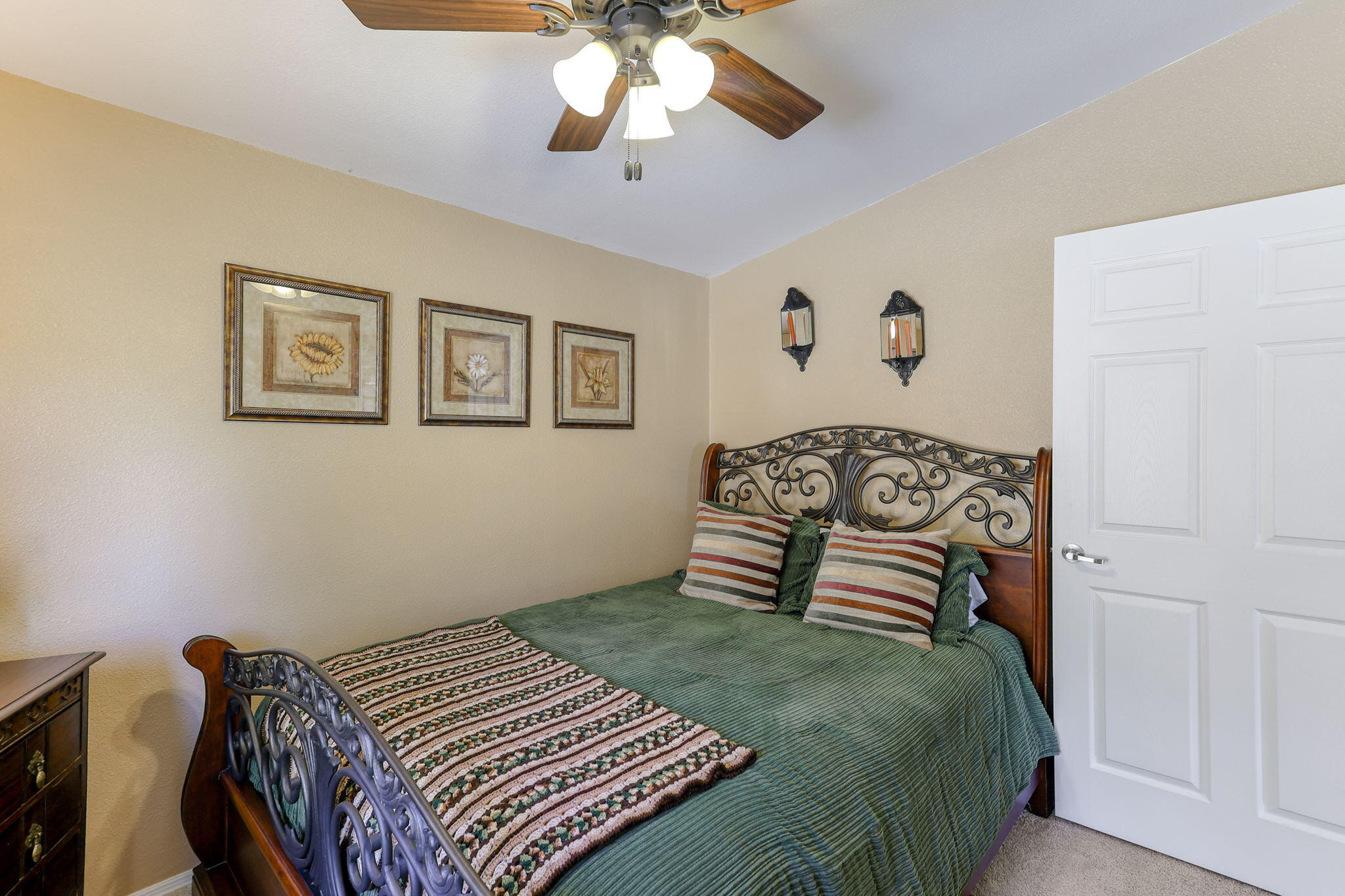 551 Lewiston Road Lewiston, CA 96052 - Photo 33 of 51 a bedroom with a bed and a chandelier