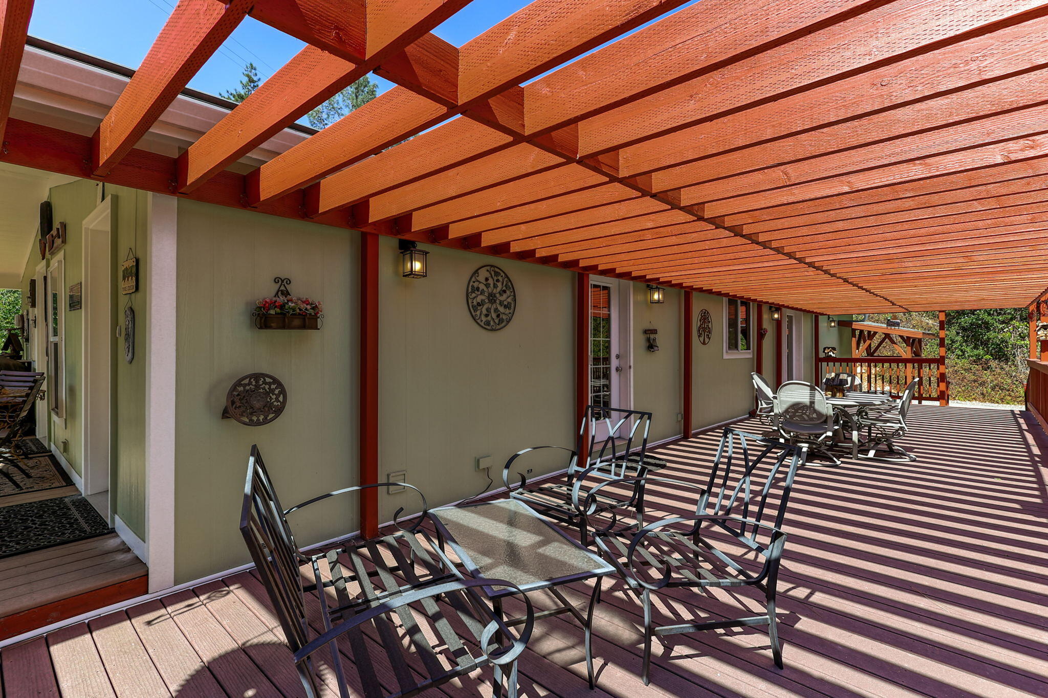 551 Lewiston Road Lewiston, CA 96052 - Photo 45 of 51 a view of a patio with table and chairs and wooden floor
