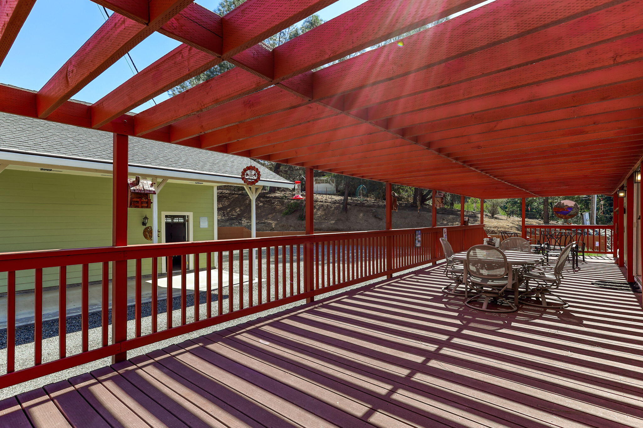551 Lewiston Road Lewiston, CA 96052 - Photo 46 of 51 a view of a patio with table and chairs and wooden floor