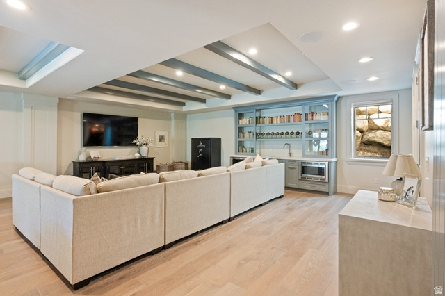 3 Carriagewood Cove, Unit 1088 Sandy, UT 84092 - Photo 50 of 79 Spacious room featuring light wood-finish flooring, recessed lighting, and a beamed ceiling