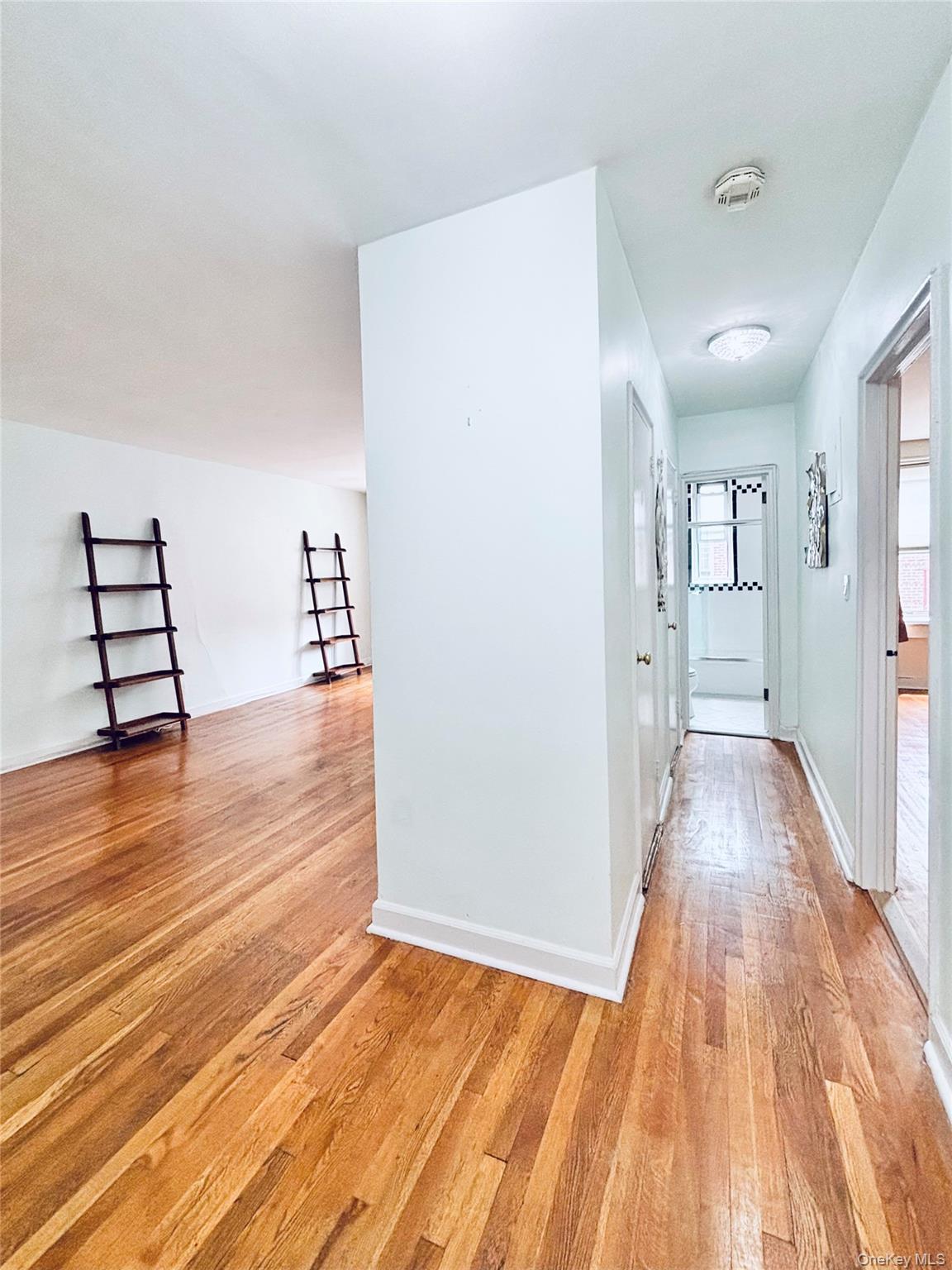 804 Bronx River Road, Unit 4G Bronxville, NY 10708 - Photo 4 of 11 a view of empty room with wooden floor