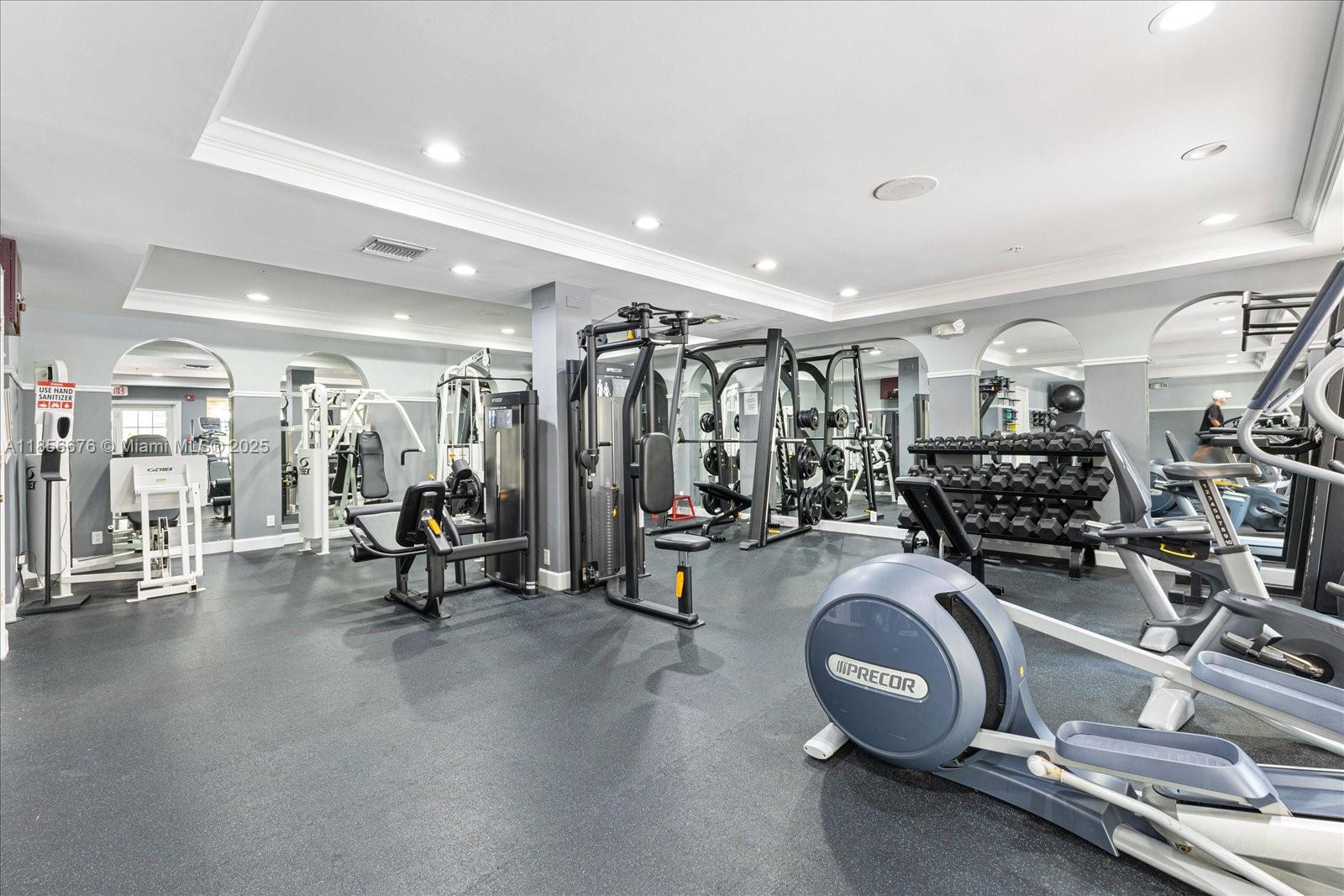 651 Okeechobee Boulevard, Unit 1002 West Palm Beach, FL 33401 - Photo 18 of 22 a view of a room with gym equipment