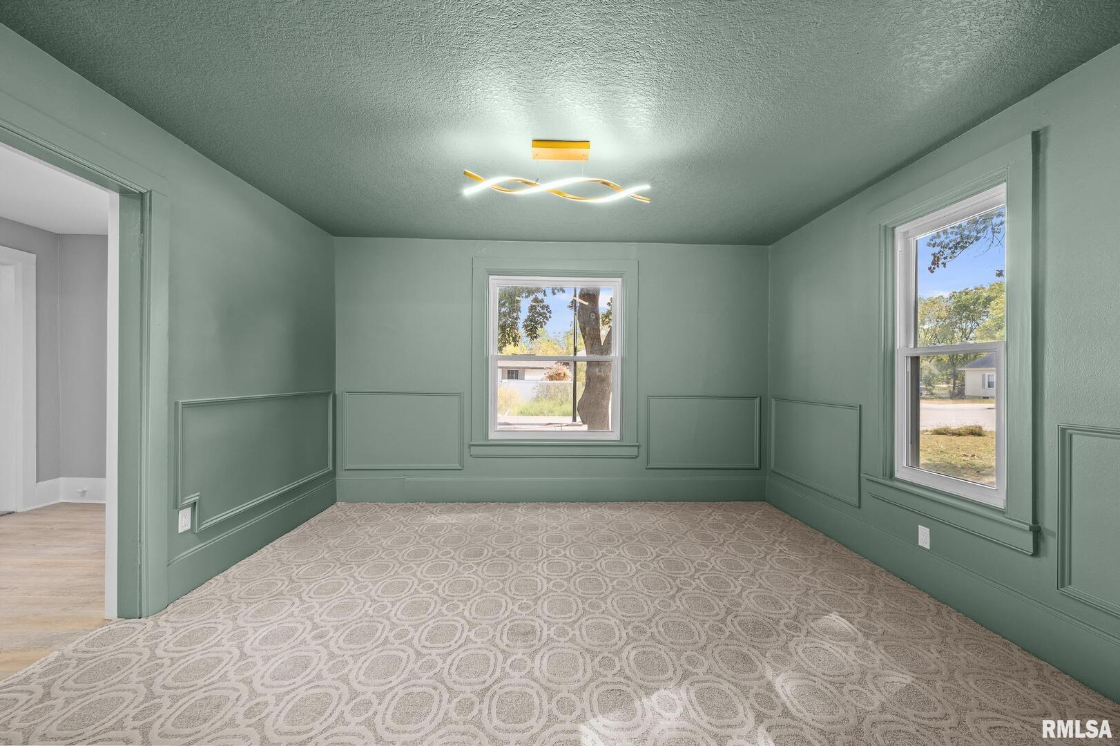 118 South 1st Street Long Grove, IA 52756 - Photo 14 of 41 a view of empty room with window