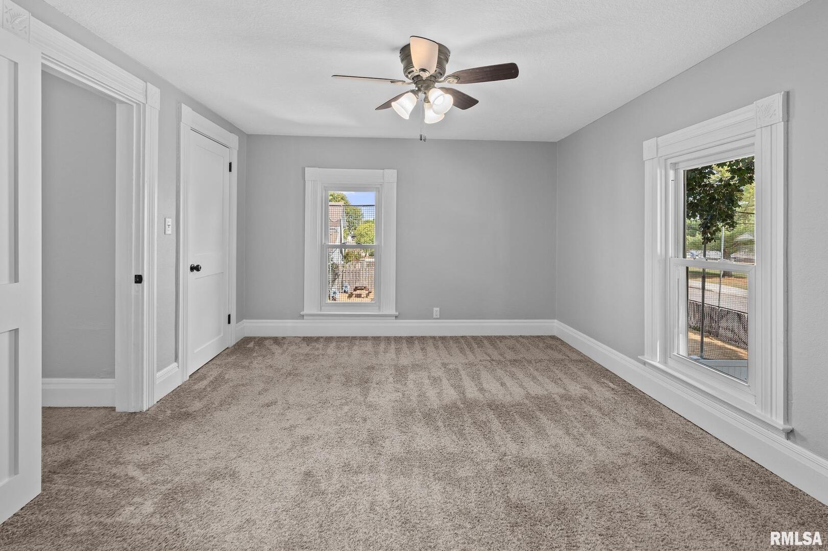 118 South 1st Street Long Grove, IA 52756 - Photo 29 of 41 a view of an empty room with a window