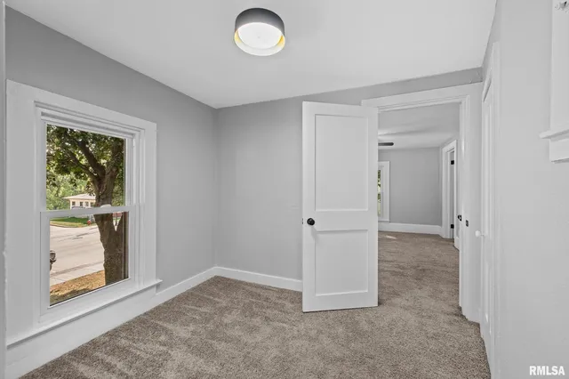 an empty room with window