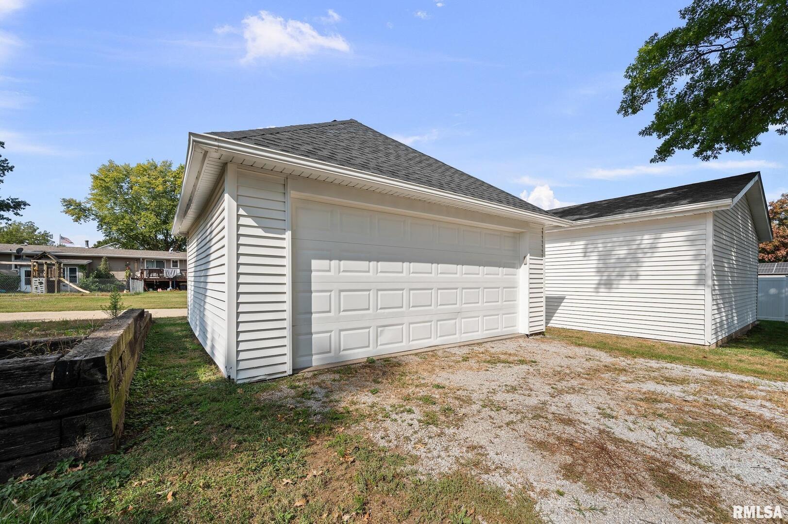 118 South 1st Street Long Grove, IA 52756 - Photo 38 of 41 a view of a house with a backyard