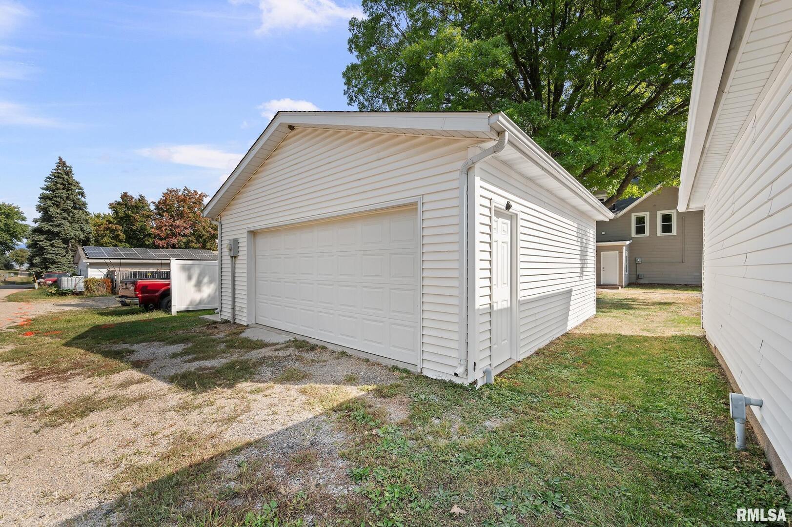 118 South 1st Street Long Grove, IA 52756 - Photo 39 of 41 a view of a house with a yard