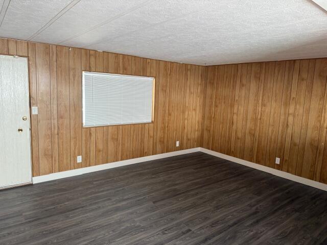 216 Imperial Avenue Thermal, CA 92274 - Photo 13 of 15 an empty room with wooden floor and windows