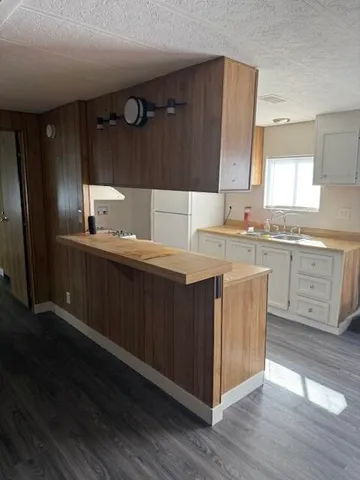 a view of balcony with furniture