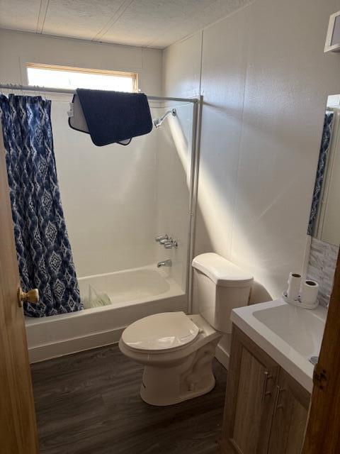 216 Imperial Avenue Thermal, CA 92274 - Photo 8 of 15 a white toilet sitting next to a bathroom sink and vanity