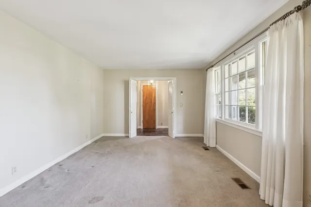 an empty room with windows