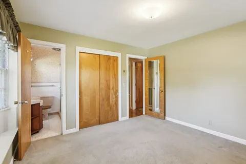 a view of a room with a bathroom