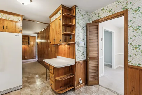 a view of a hallway with elevator