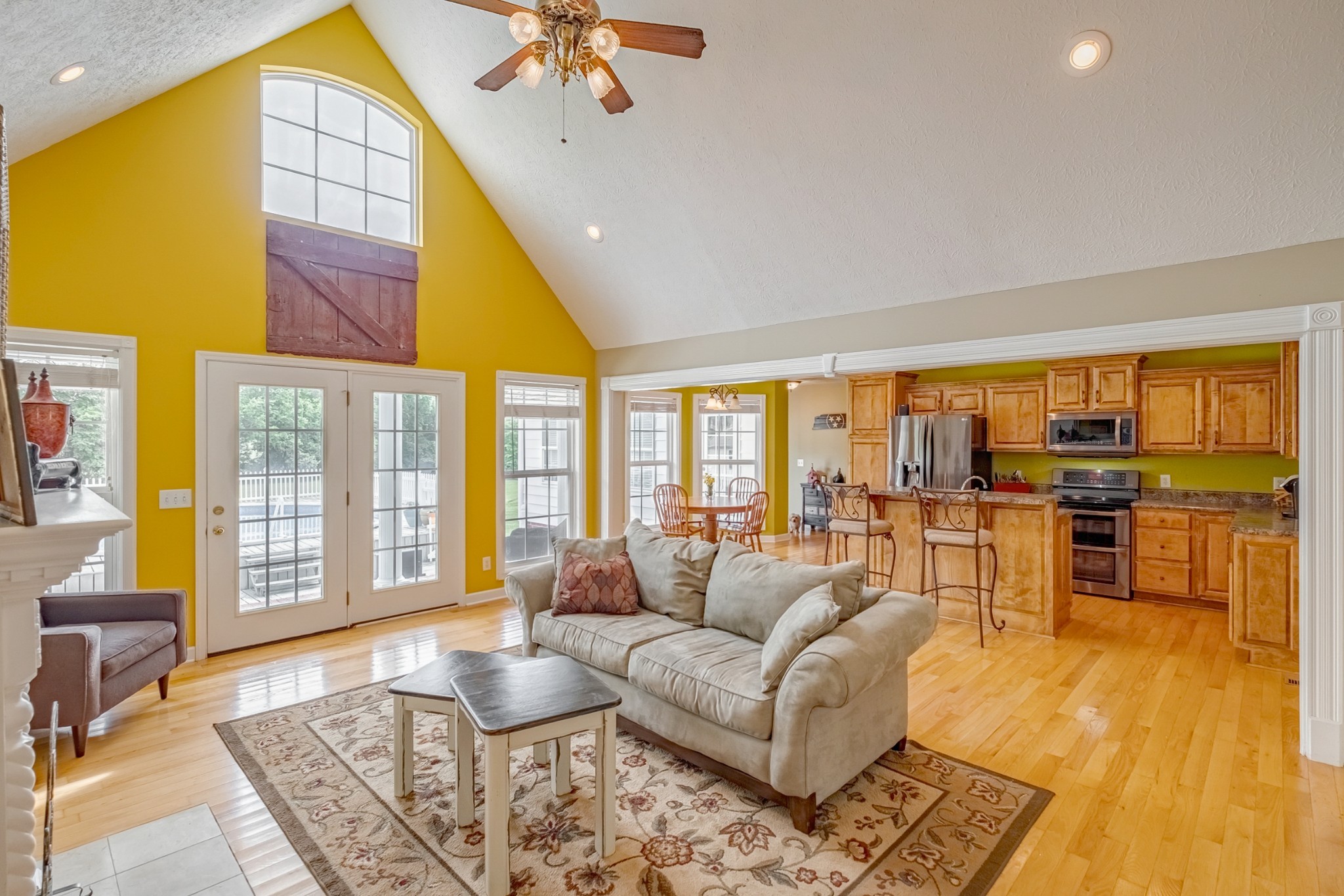1043 Emerald Way Castalian Springs, TN 37031 - Photo 11 of 45 a living room with furniture and floor to ceiling windows