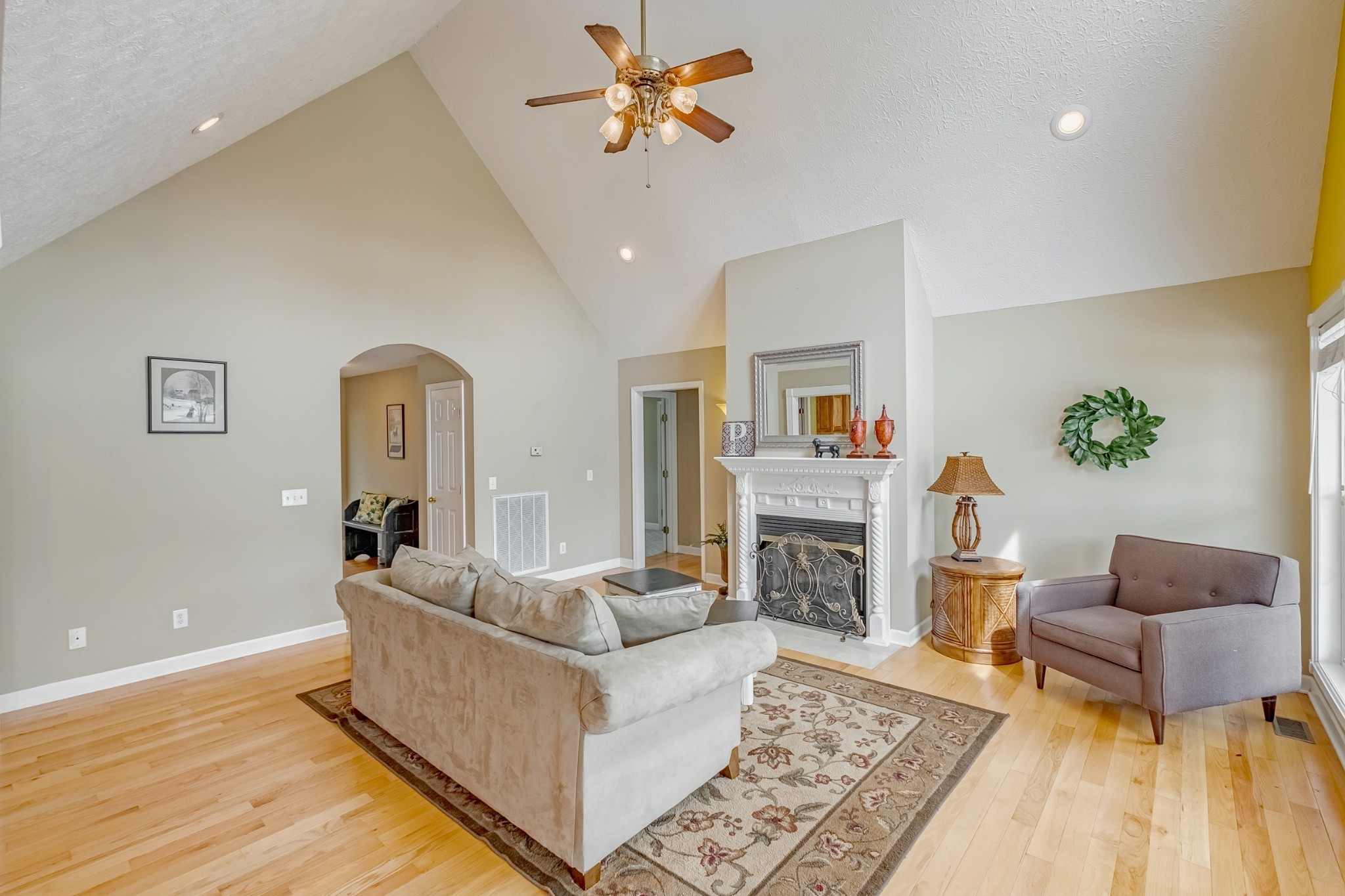 1043 Emerald Way Castalian Springs, TN 37031 - Photo 14 of 45 a living room with furniture and a fireplace