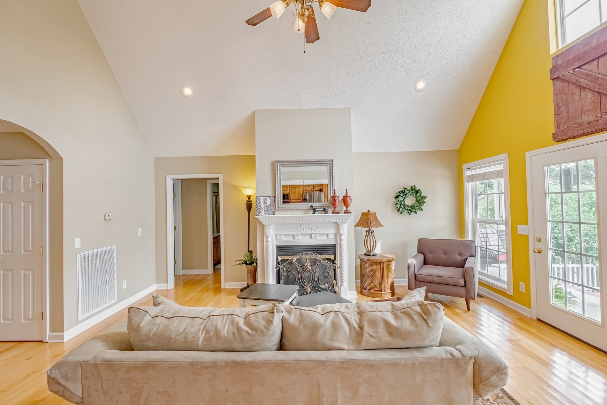 1043 Emerald Way Castalian Springs, TN 37031 - Photo 15 of 45 a living room with fireplace furniture and a large window