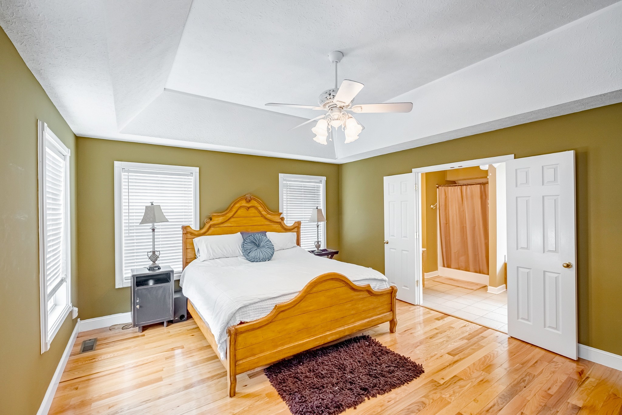 1043 Emerald Way Castalian Springs, TN 37031 - Photo 21 of 45 a bedroom with a large bed and a window