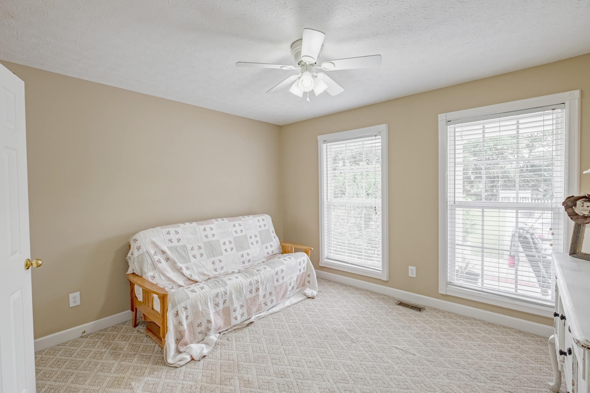 1043 Emerald Way Castalian Springs, TN 37031 - Photo 26 of 45 a living room with furniture and a chandelier