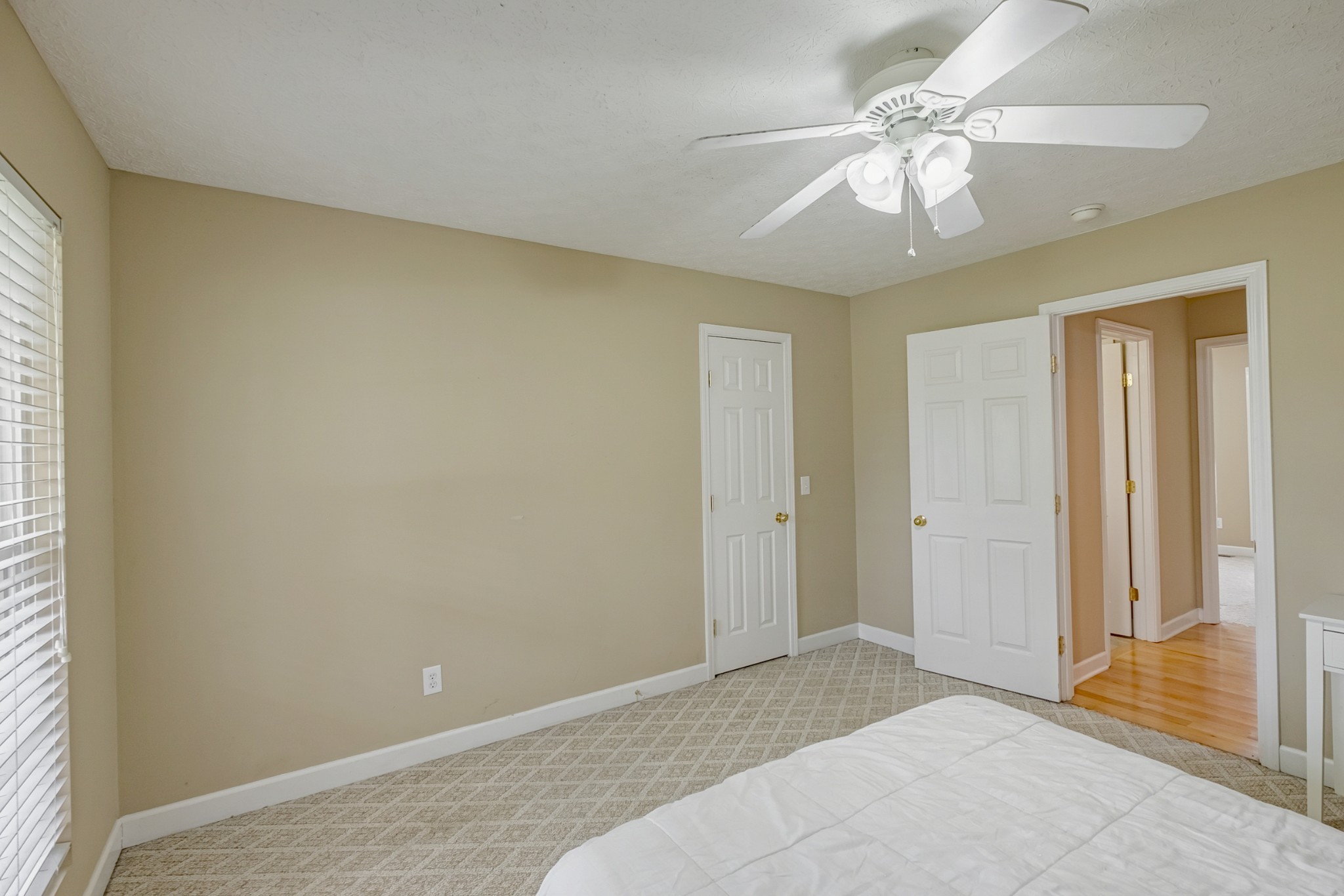 1043 Emerald Way Castalian Springs, TN 37031 - Photo 31 of 45 a view of a room with a ceiling fan and a window