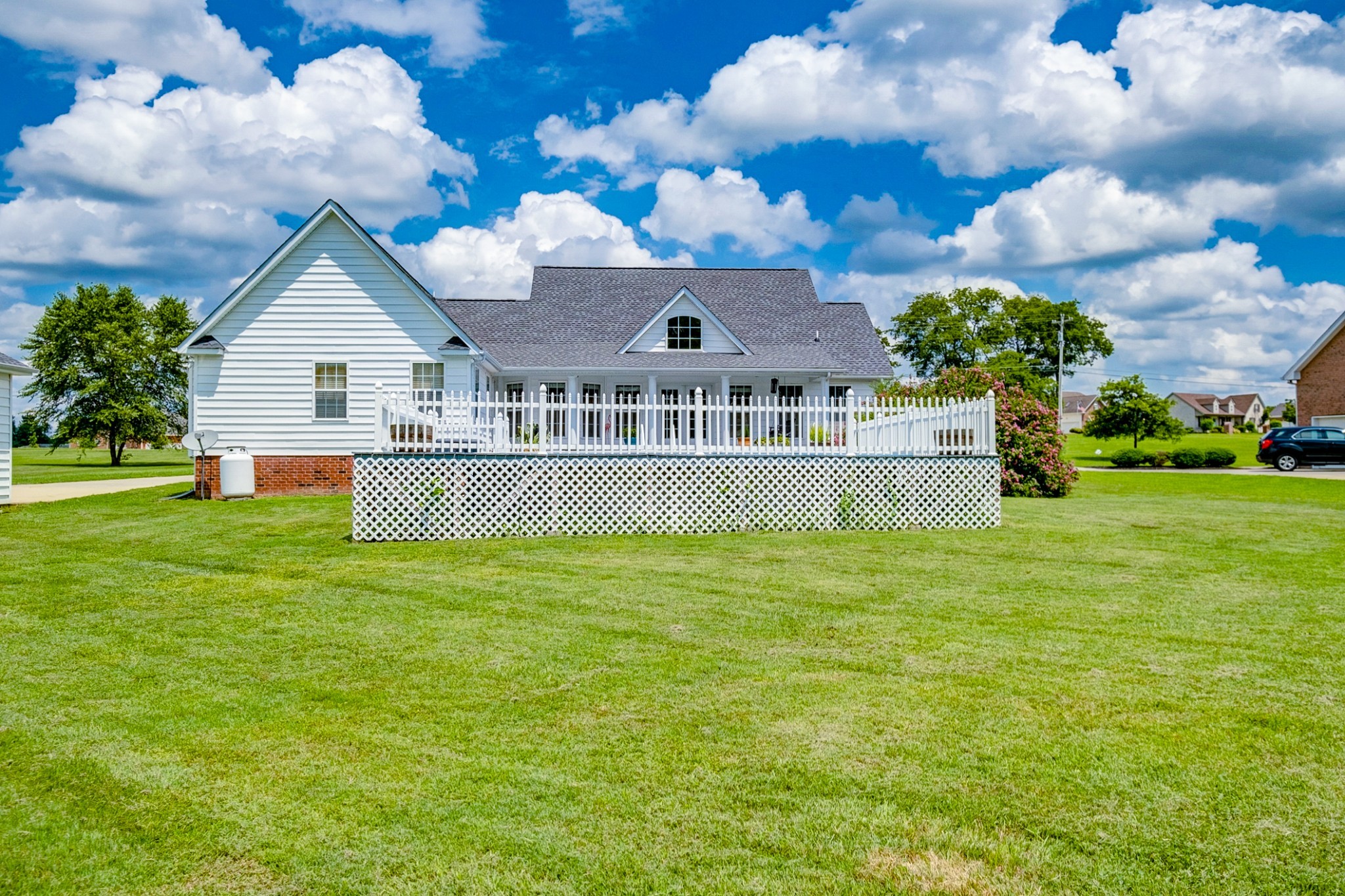 1043 Emerald Way Castalian Springs, TN 37031 - Photo 40 of 45 a front view of a house with a yard