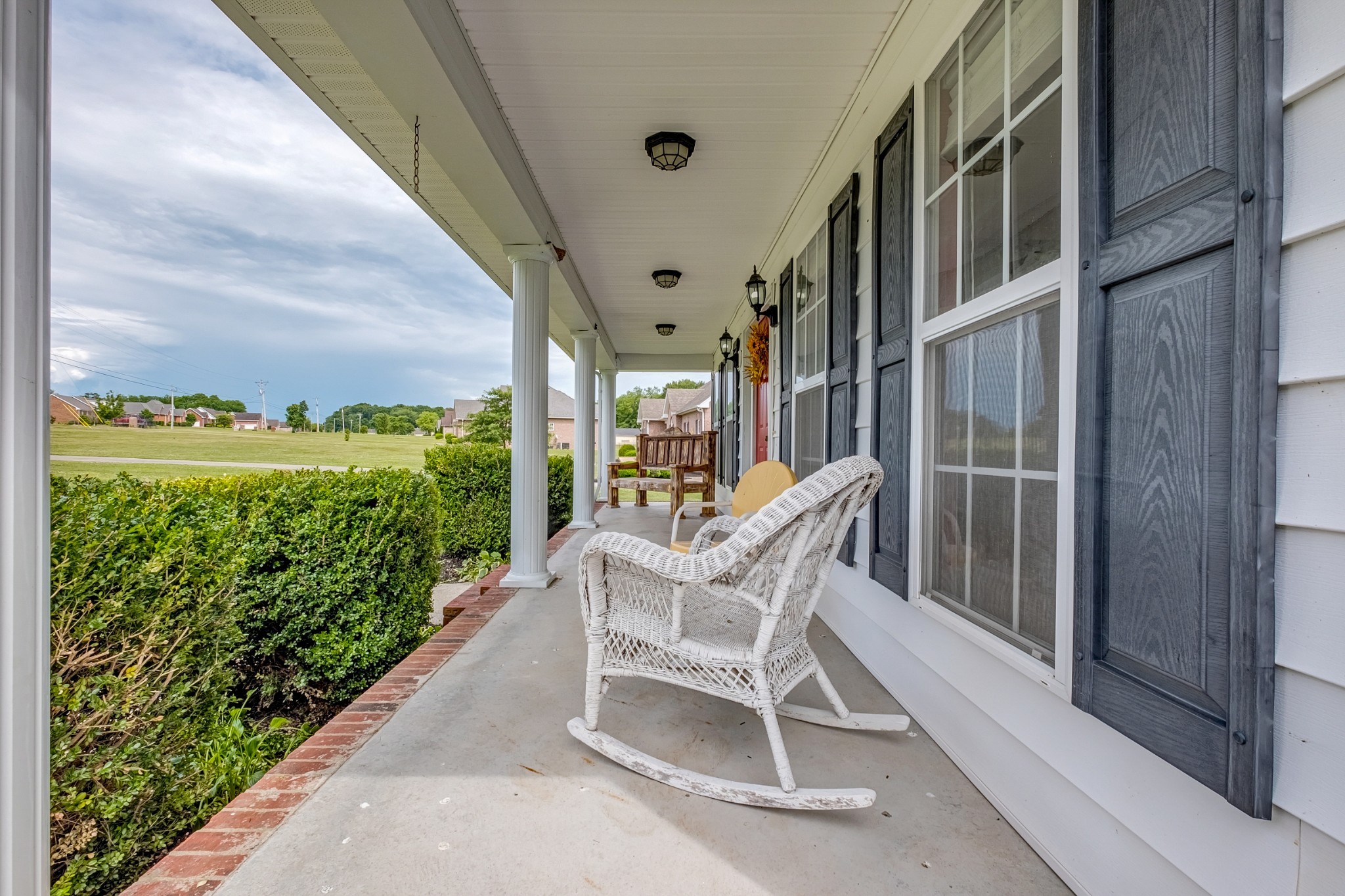 1043 Emerald Way Castalian Springs, TN 37031 - Photo 7 of 45 a view of an chairs and table in the balcony