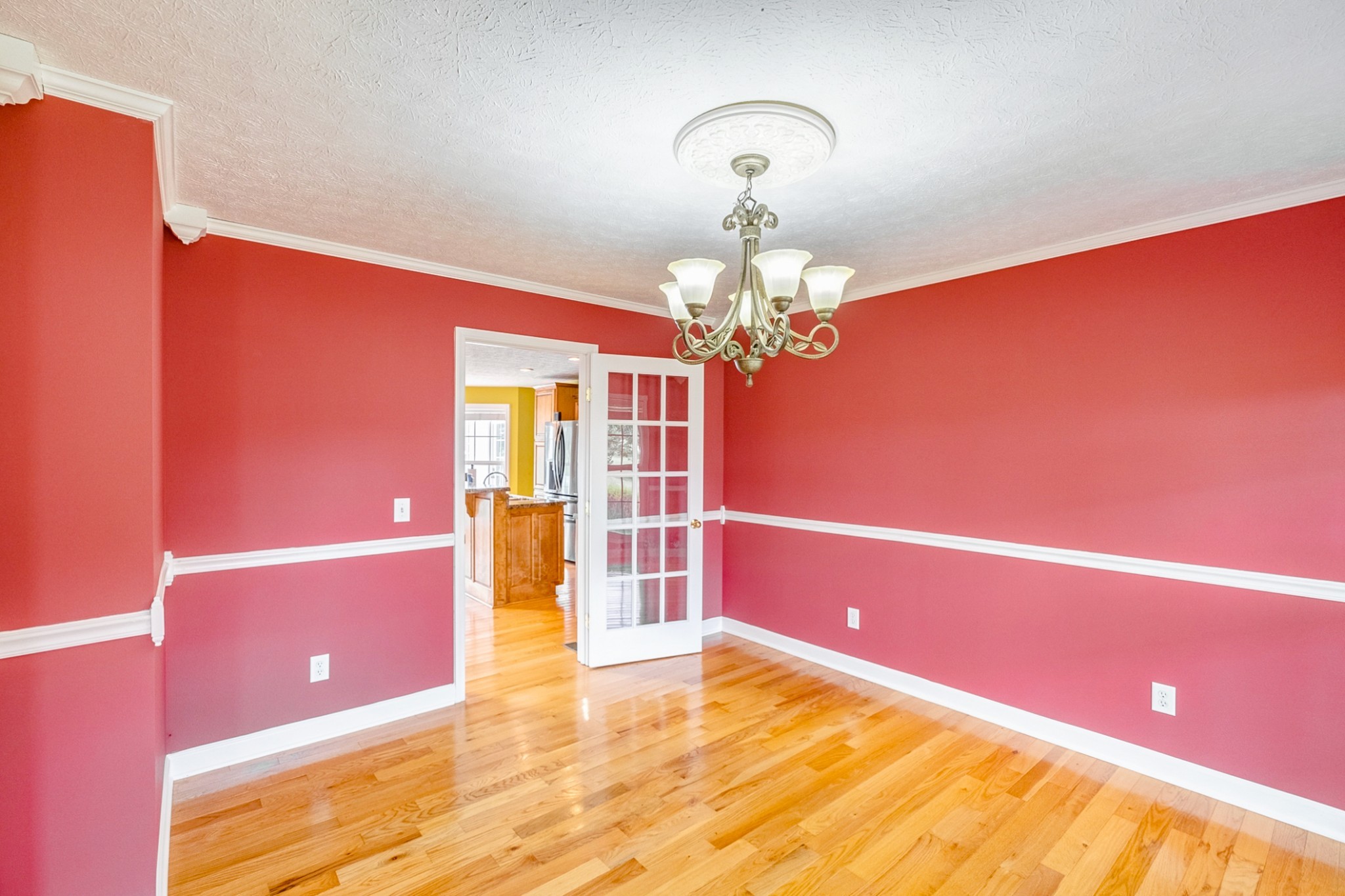 1043 Emerald Way Castalian Springs, TN 37031 - Photo 9 of 45 a view of a livingroom with a chandelier