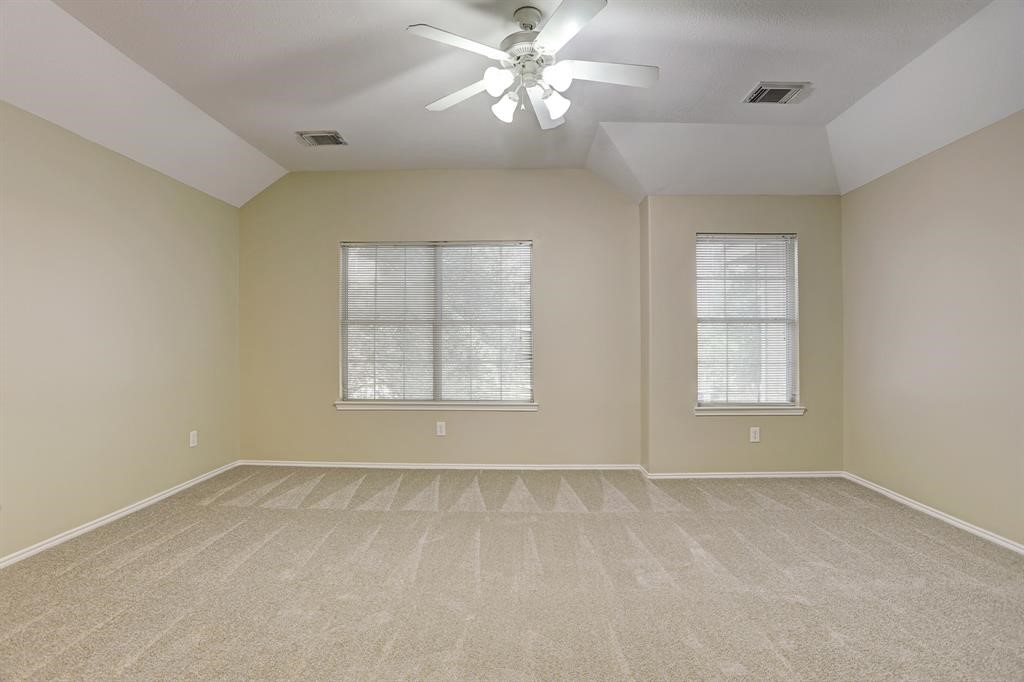 281 Brandy Ridge Lane Dickinson, TX 77539 - Photo 8 of 10 wooden floor in an empty room with a window