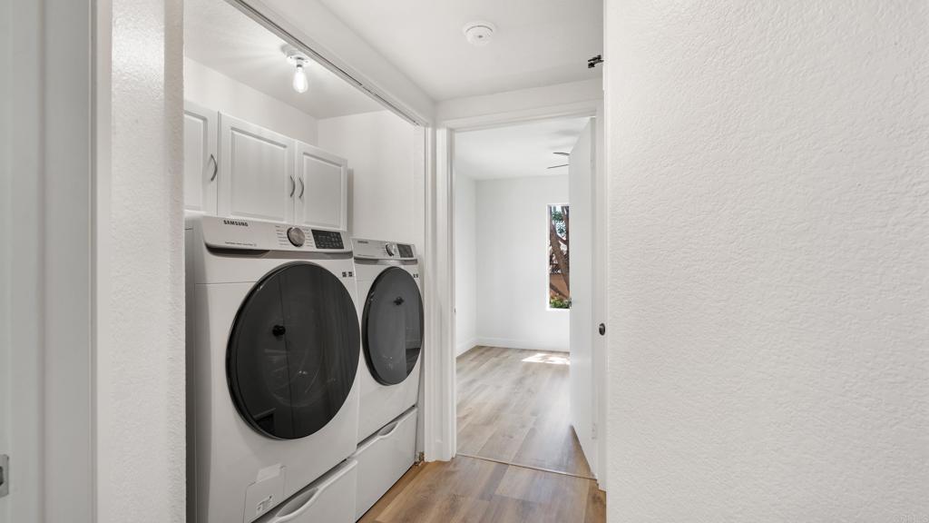 415 Stoney Point Way, Unit 106 Oceanside, CA 92058 - Photo 26 of 35 a utility room with dryer and washer
