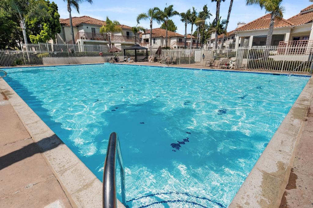 415 Stoney Point Way, Unit 106 Oceanside, CA 92058 - Photo 29 of 35 a backyard of a house with lots of green space