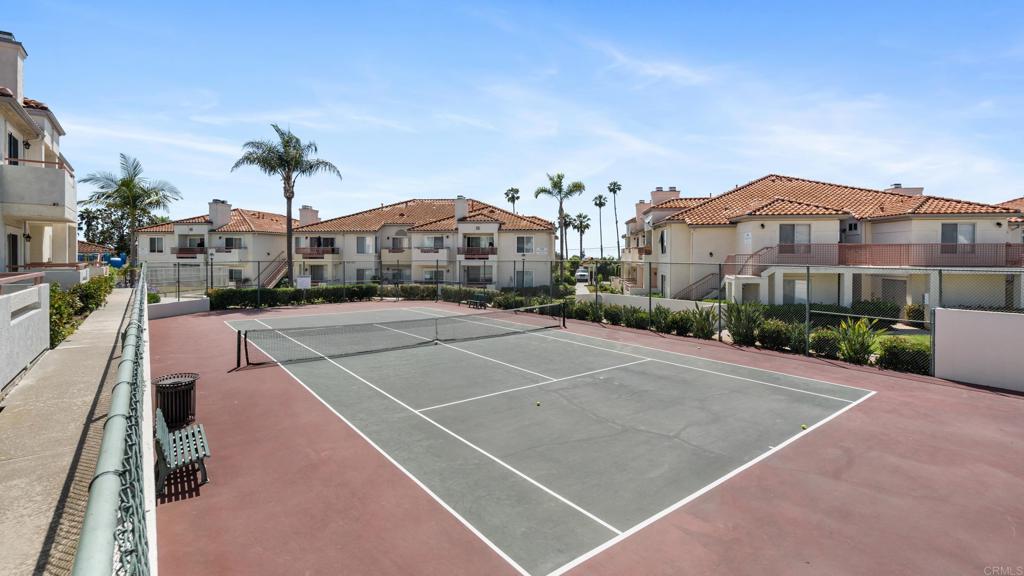 415 Stoney Point Way, Unit 106 Oceanside, CA 92058 - Photo 31 of 35 a view of a tennis court