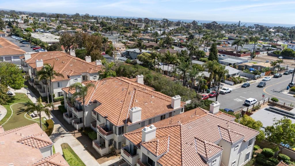 415 Stoney Point Way, Unit 106 Oceanside, CA 92058 - Photo 32 of 35 an aerial view of a house with yard