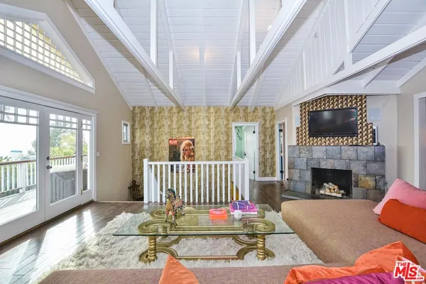 a view of balcony with furniture