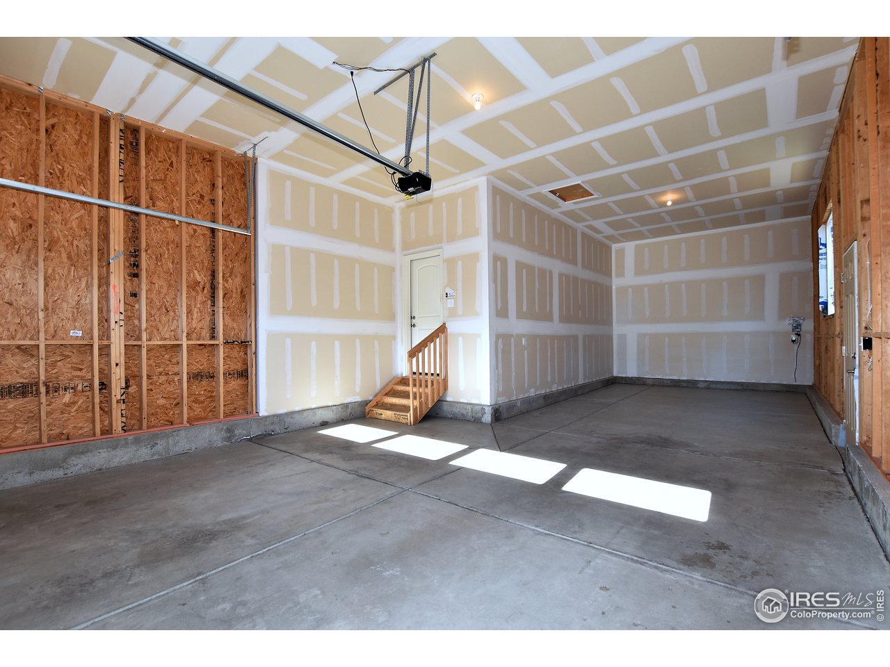 882 Wagon Bend Road Berthoud, CO 80513 - Photo 21 of 31 Three car tandem garage.