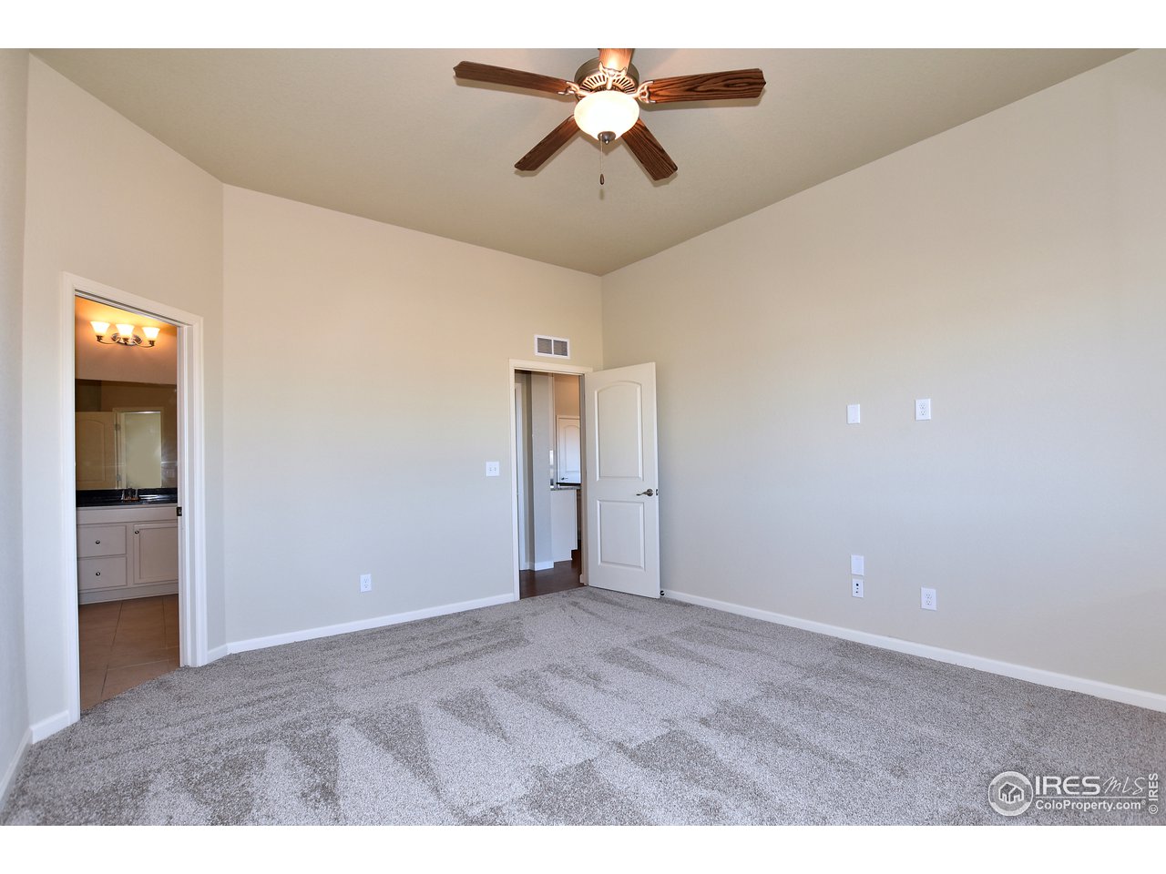 882 Wagon Bend Road Berthoud, CO 80513 - Photo 10 of 31 Owner's suite. New carpet throughout home.