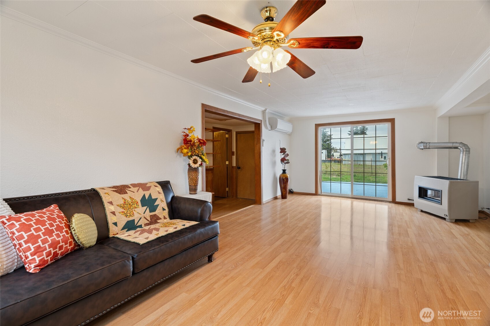7007 Dahlberg Road Ferndale, WA 98248 - Photo 12 of 35 a living room with furniture and a large window