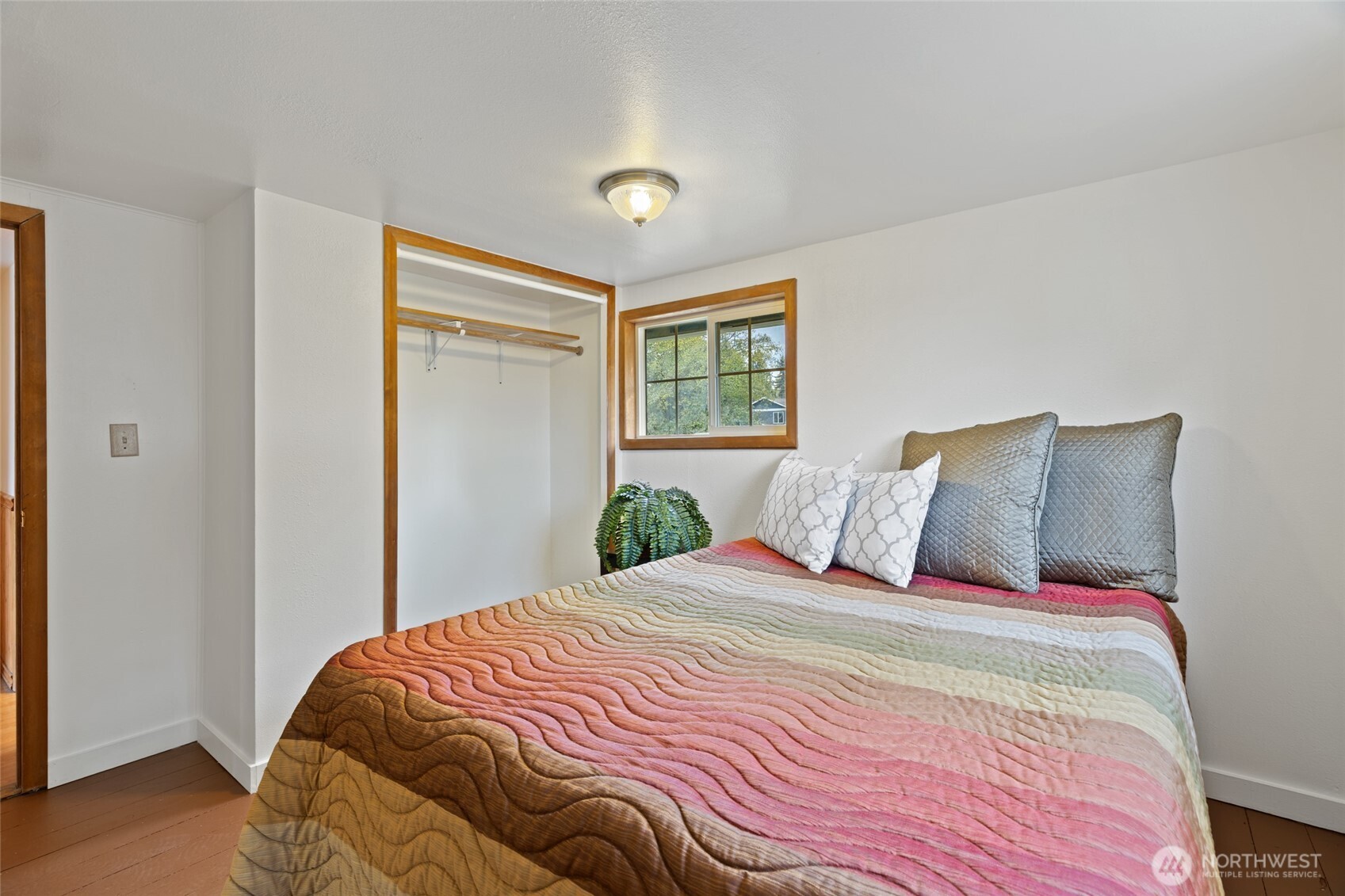 7007 Dahlberg Road Ferndale, WA 98248 - Photo 17 of 35 a bedroom with a bed and a window