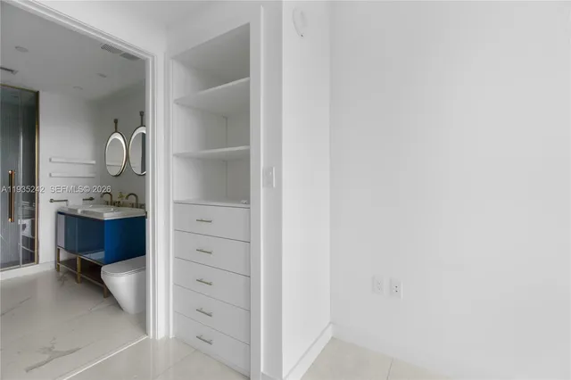 a view of a terrace with garden and bench