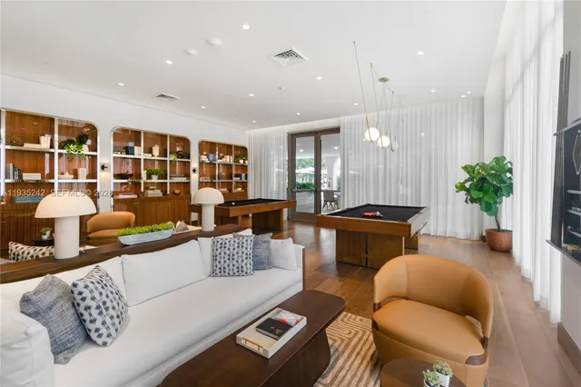 a view of a swimming pool with a lounge chair