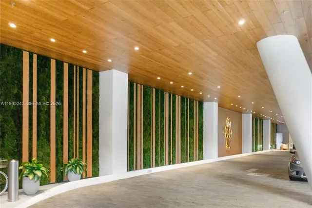 a view of a swimming pool with outdoor seating