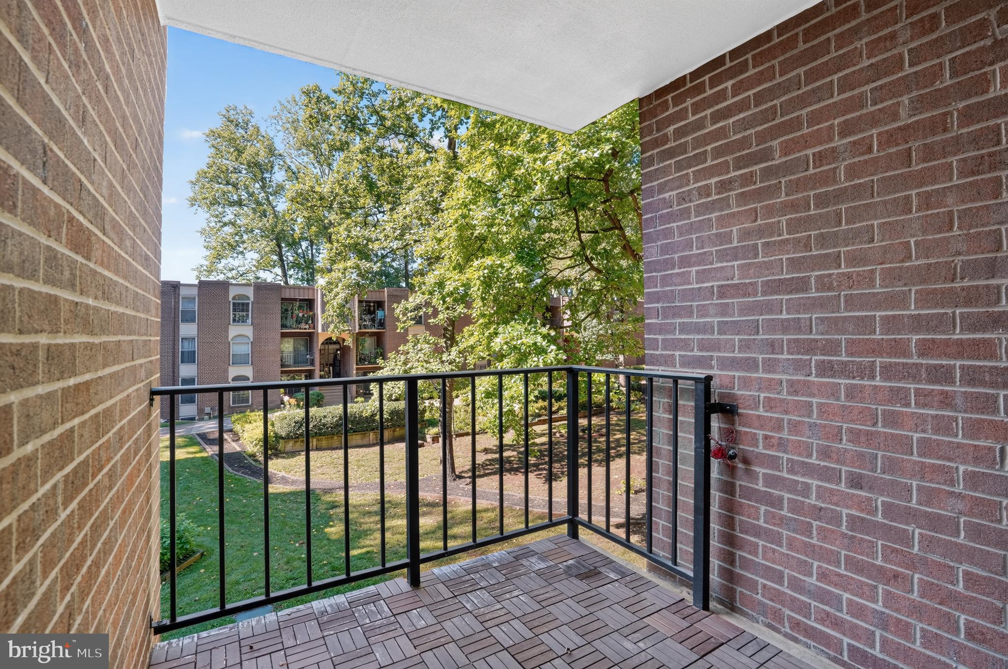3358 Woodburn Road, Unit 22 Annandale, VA 22003 - Photo 3 of 19 Courtyard view from private balcony