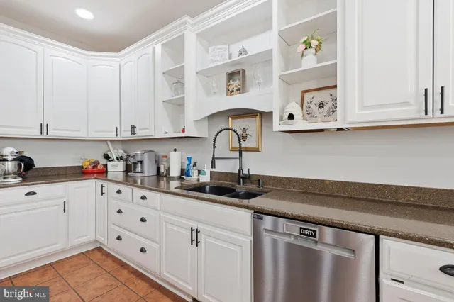 a kitchen with appliances and cabinets