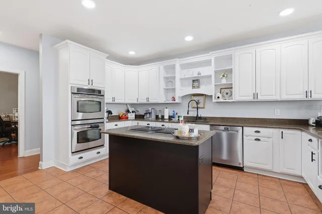 a view of outdoor space with wooden floor