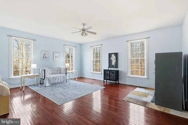 a bedroom with a bed and a table in it