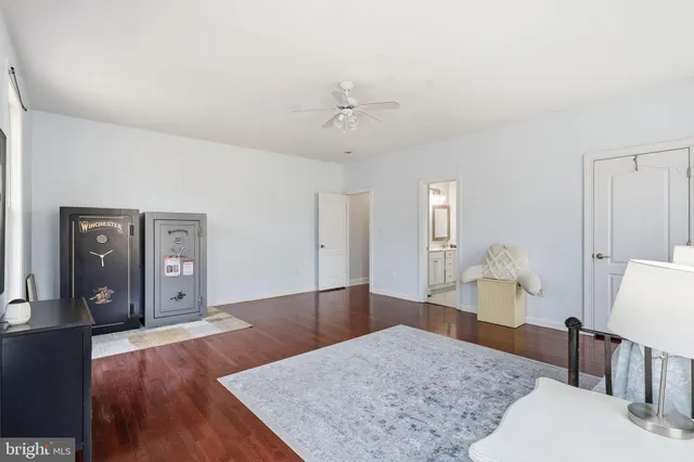 a view of room with wooden floor and window