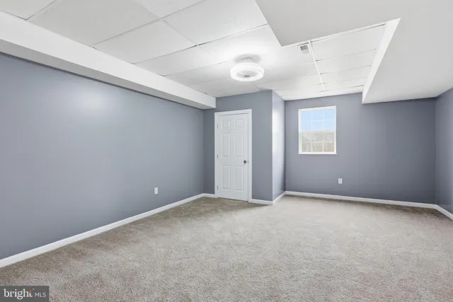 a bedroom with a workspace