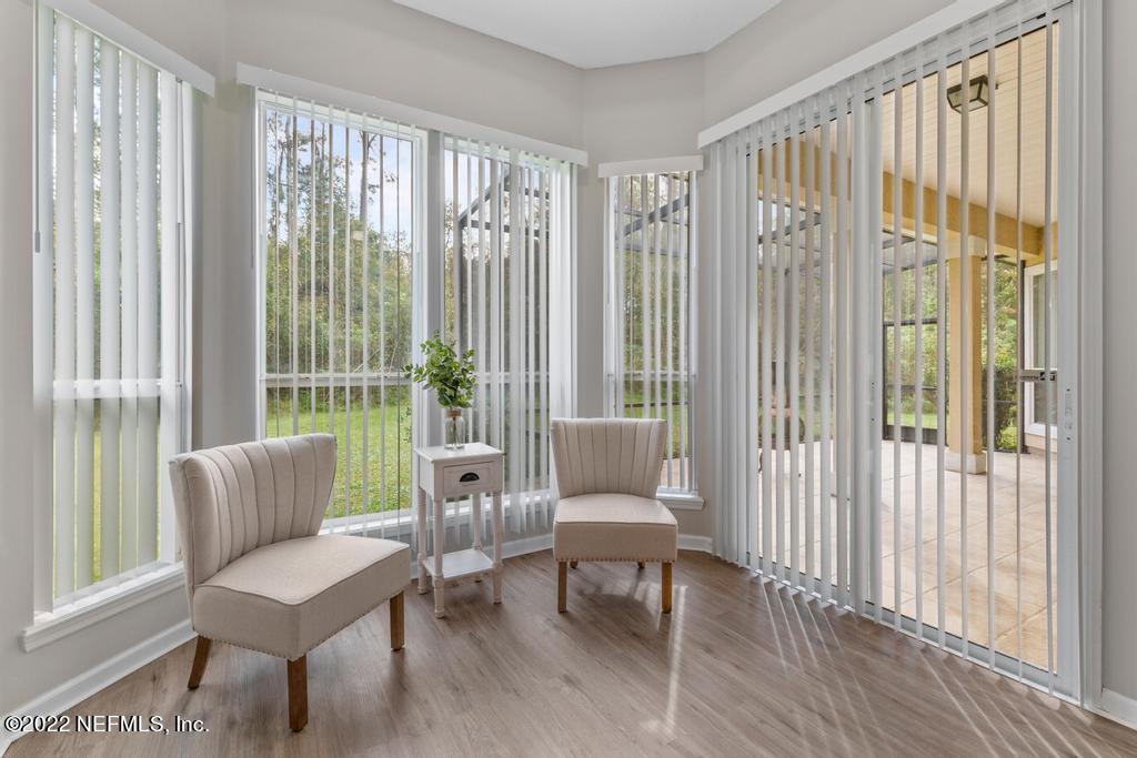 1229 Paradise Pond Road St. Augustine, FL 32092 - Photo 19 of 23 a living room with furniture and a large window