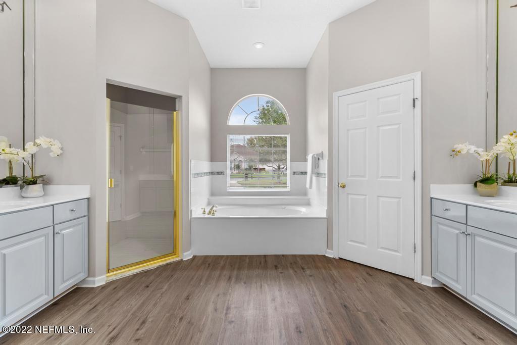 1229 Paradise Pond Road St. Augustine, FL 32092 - Photo 20 of 23 a view of an entryway with wooden floor and cabinet