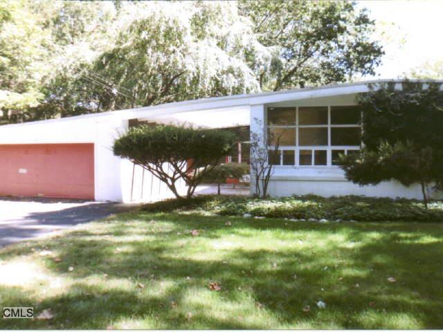 901 Stillwater Road Stamford, CT 06902 - Photo 1 of 1 a house view with a garden space